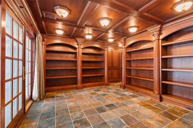 a kitchen with stainless steel appliances granite countertop a stove and a microwave