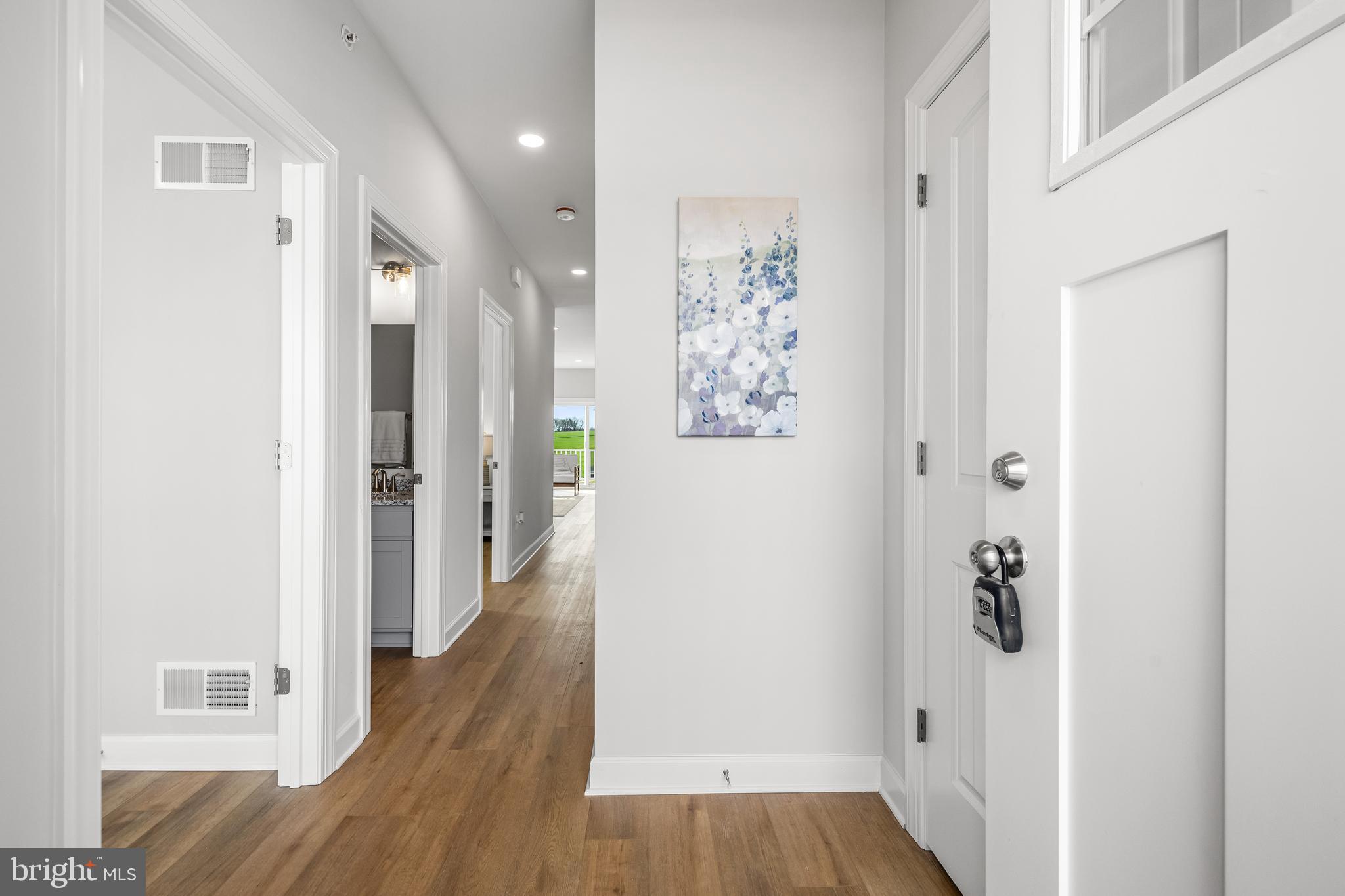 212 Ridgeview Lane, Unit 30 Hanover, PA 17331 - Photo 5 of 39 a view of a hallway with wooden floor