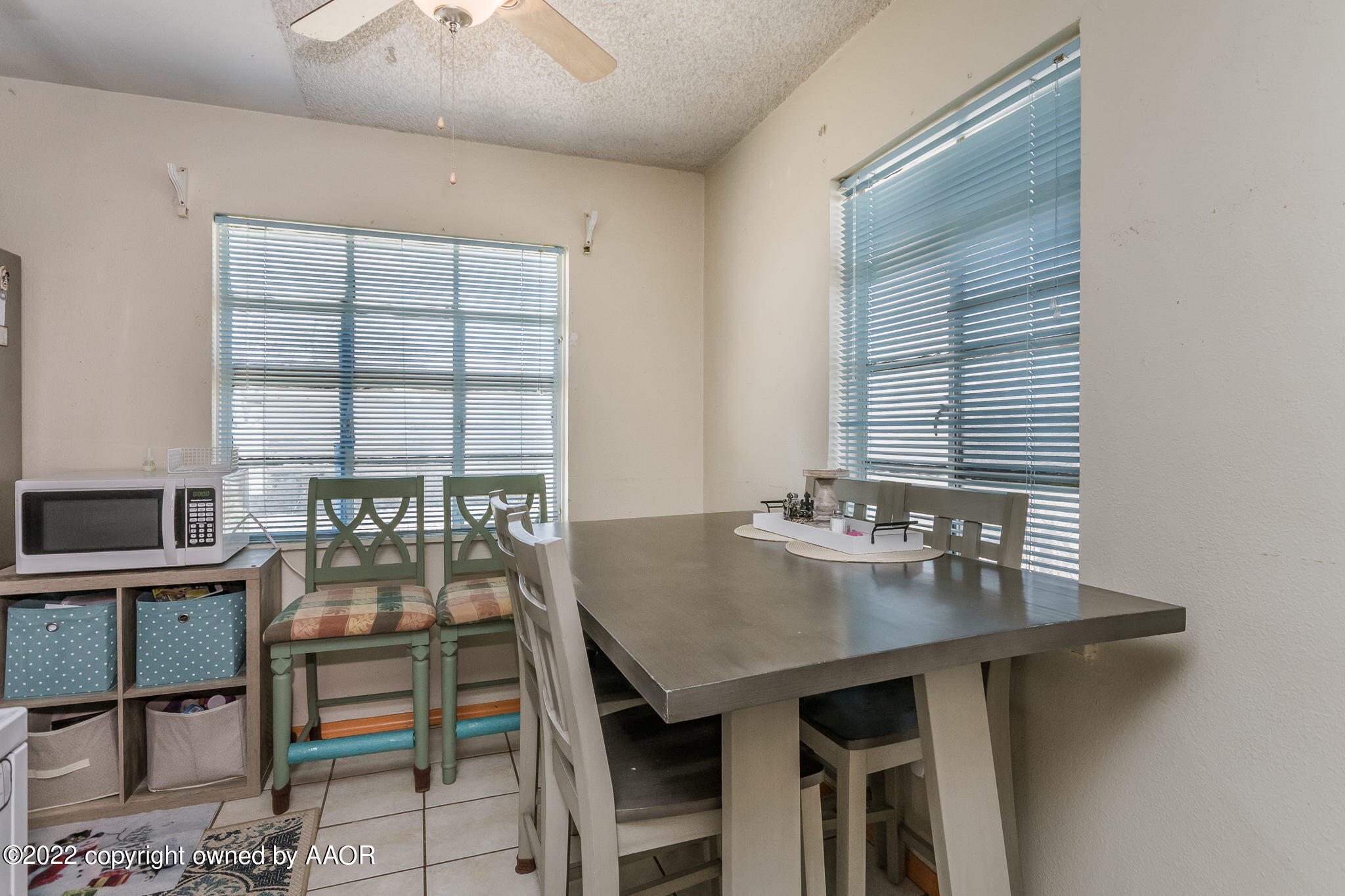 4409 South Travis Street Amarillo, TX 79110 - Photo 4 of 14 a view of a dining room with furniture and window