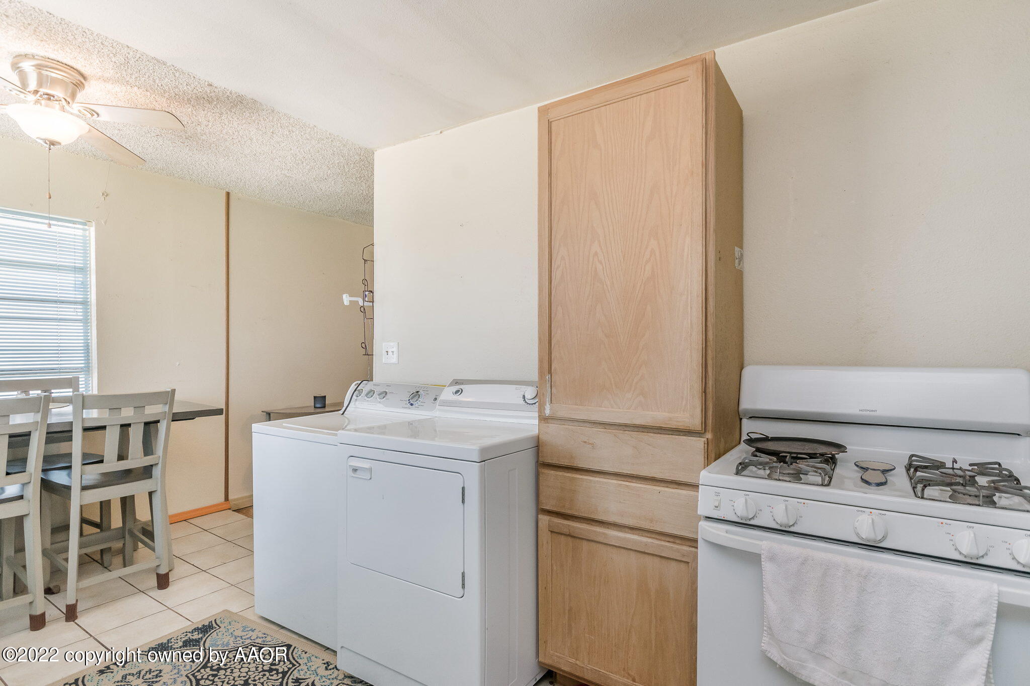 4409 South Travis Street Amarillo, TX 79110 - Photo 7 of 14 a room with storage and utility