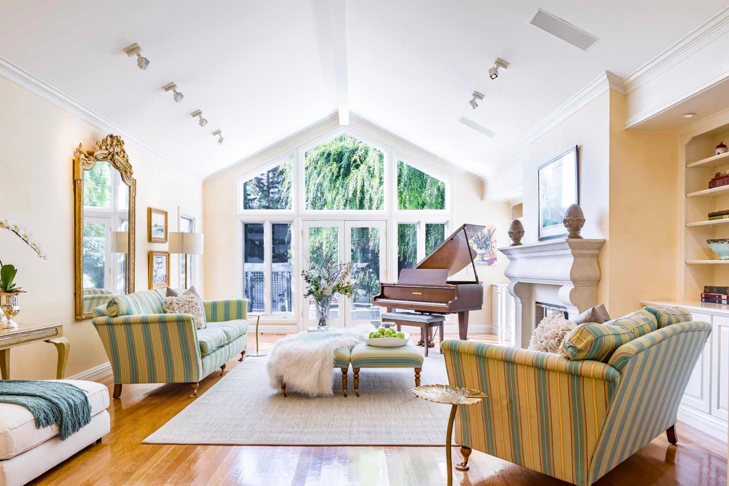 11491 Old Ranch Road Los Altos Hills, CA 94024 - Photo 14 of 52 a living room with furniture and a large window
