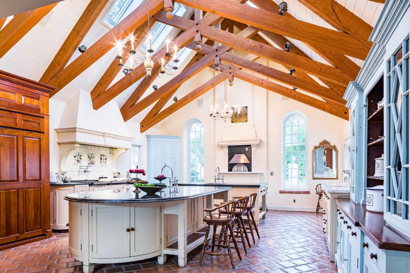 11491 Old Ranch Road Los Altos Hills, CA 94024 - Photo 19 of 52 a living room with furniture and a large window