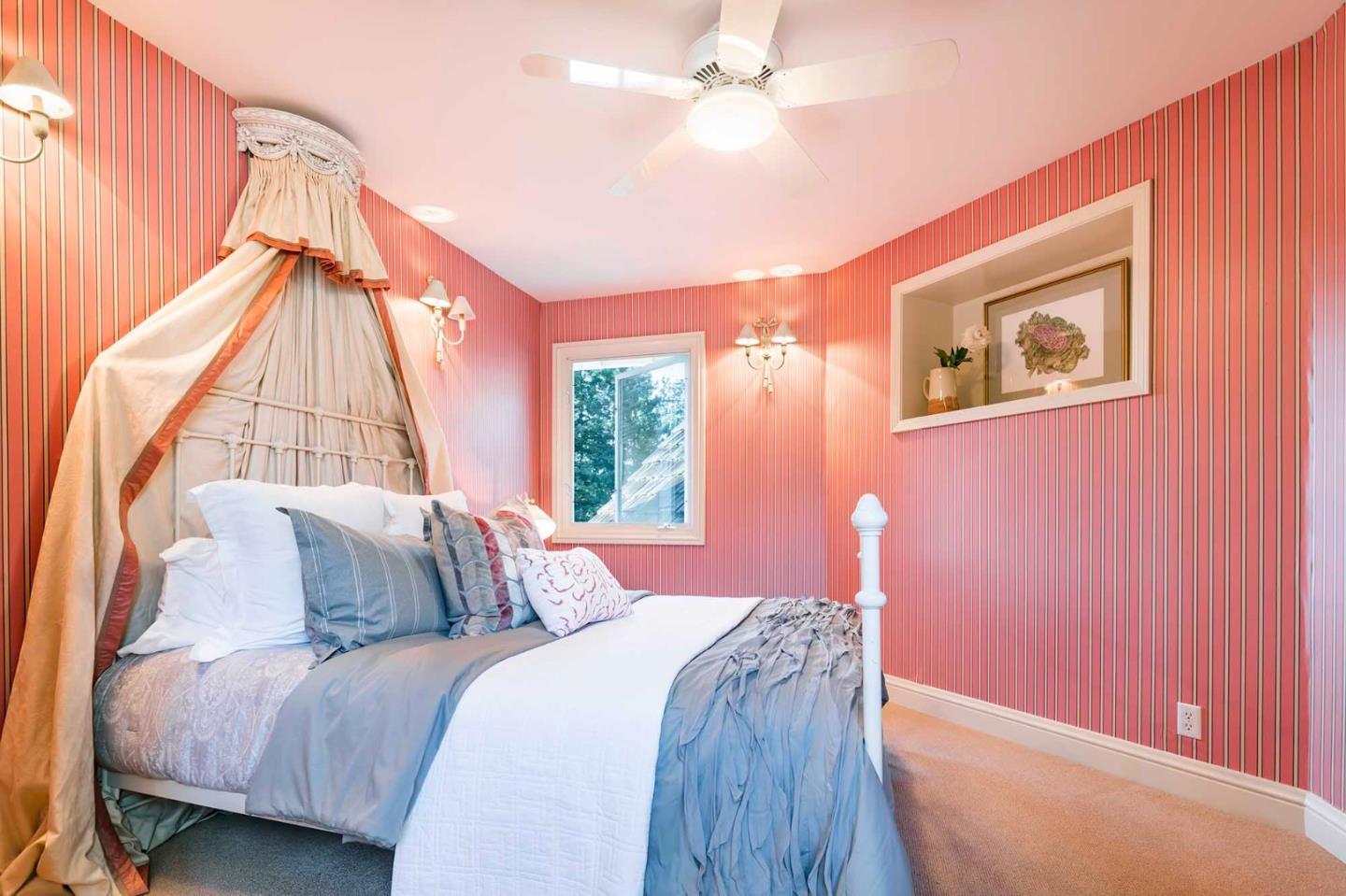 11491 Old Ranch Road Los Altos Hills, CA 94024 - Photo 25 of 52 a bedroom with a bed and a window