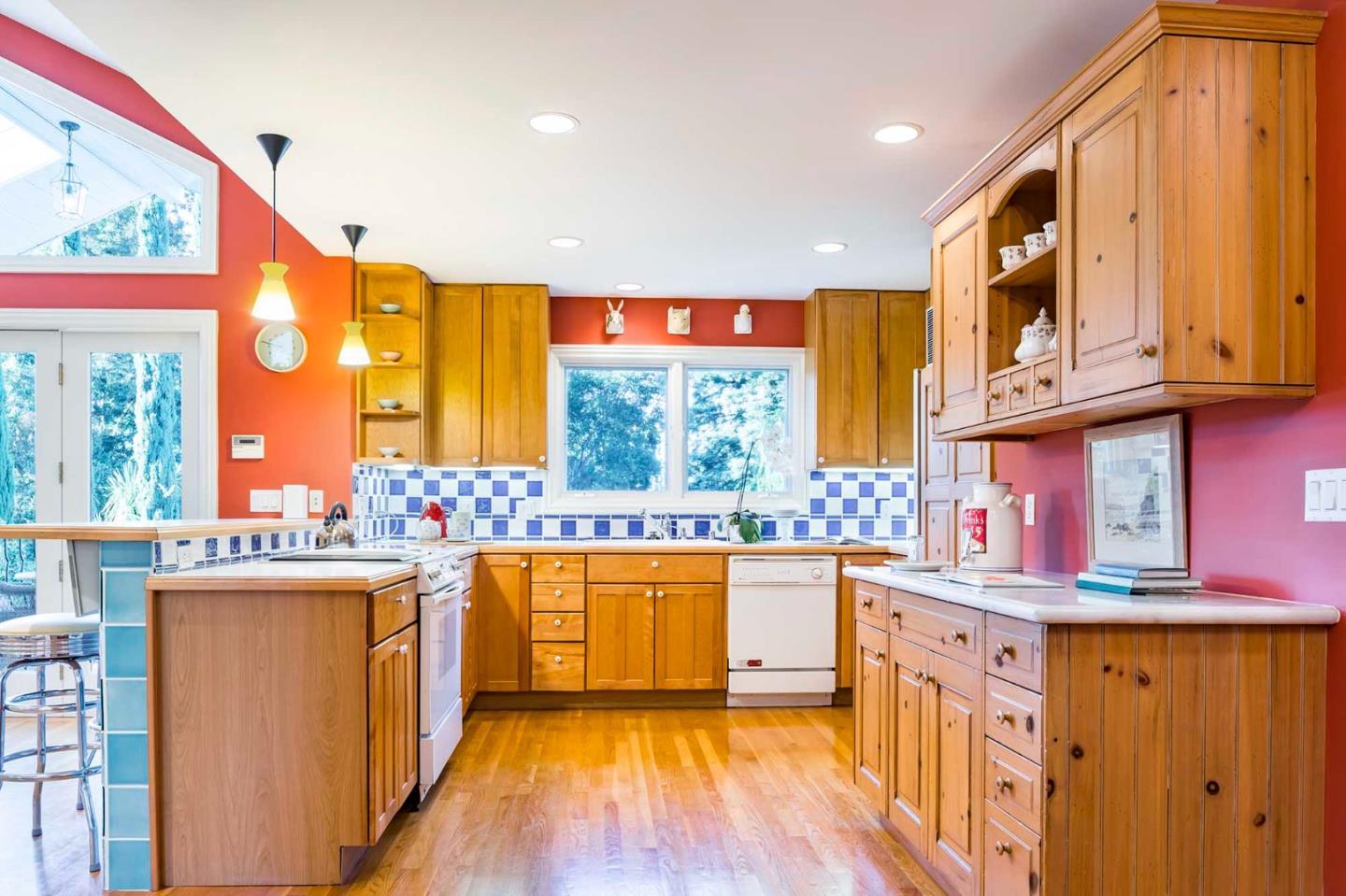 11491 Old Ranch Road Los Altos Hills, CA 94024 - Photo 33 of 52 a kitchen with stainless steel appliances granite countertop a stove and cabinets