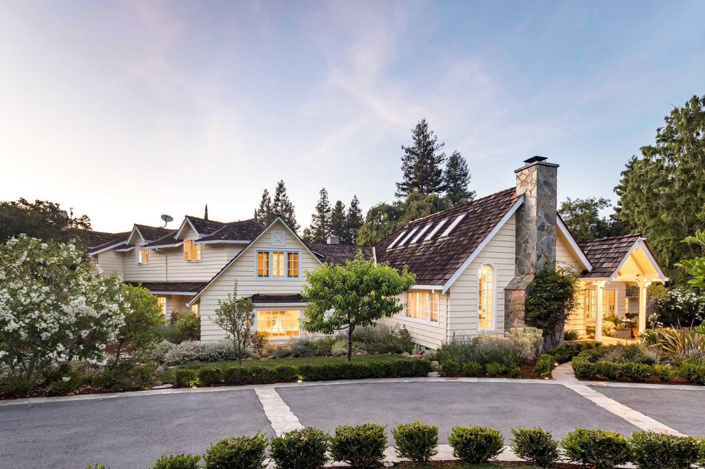 11491 Old Ranch Road Los Altos Hills, CA 94024 - Photo 45 of 52 a front view of house with yard and trees in the background