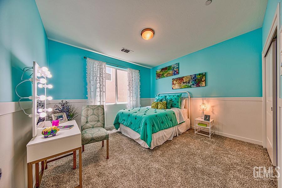 Undisclosed Address Bakersfield, CA 93311 - Photo 6 of 11 a bedroom with furniture and a bed