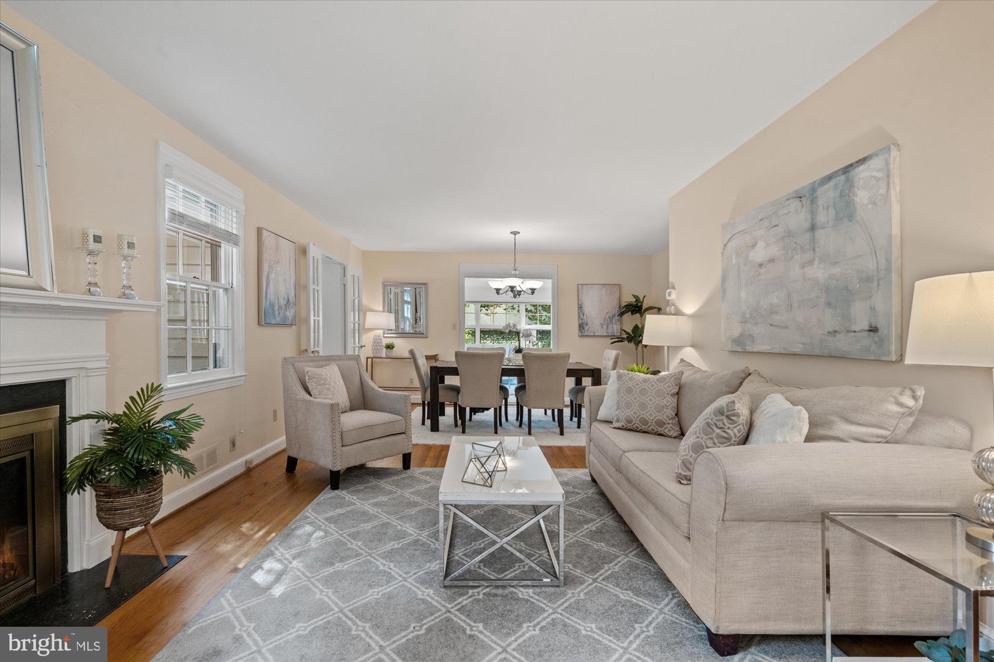 9500 Columbia Boulevard Silver Spring, MD 20910 - Photo 2 of 19 Lovely open living/dining room with a fireplace