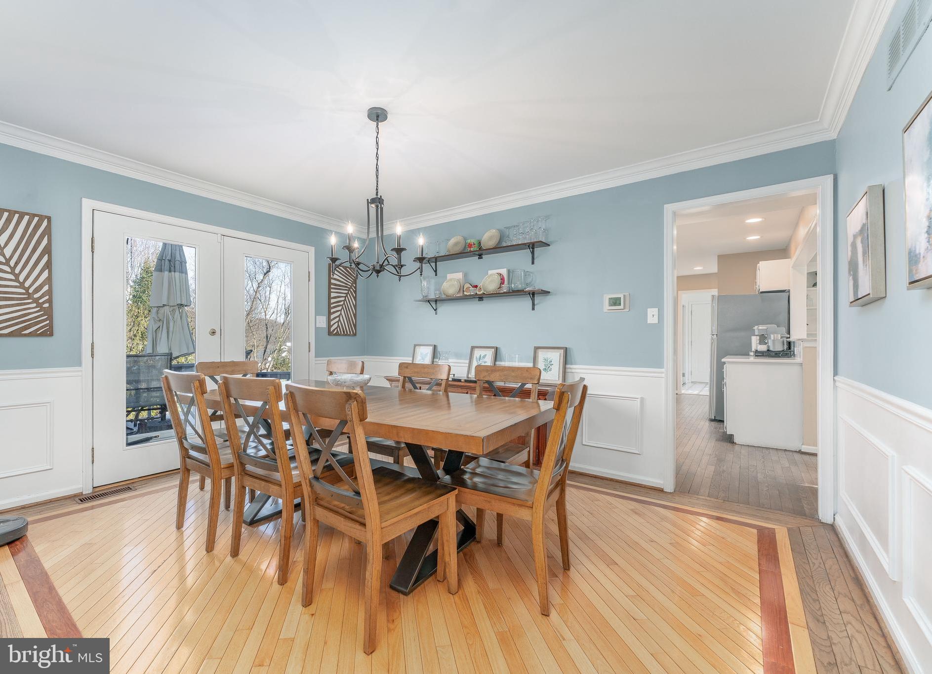 8 Matthews Run Road Chester Springs, PA 19425 - Photo 24 of 80 a view of a dining room with furniture window and wooden floor