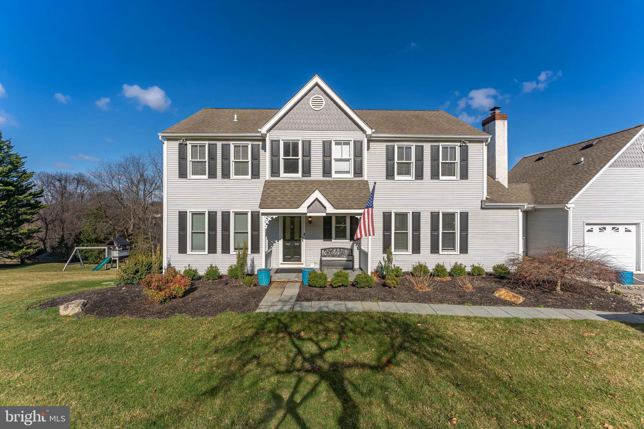 8 Matthews Run Road Chester Springs, PA 19425 - Photo 3 of 80 a front view of a house with garden