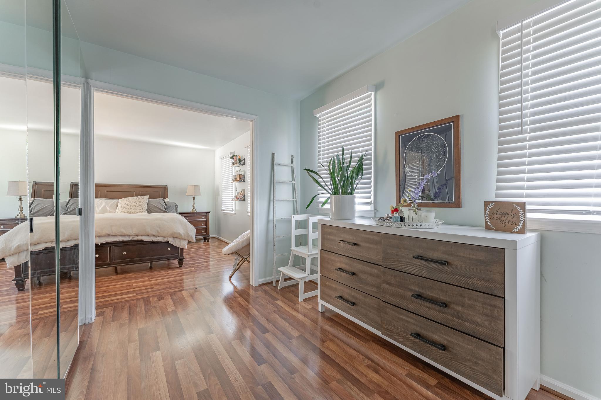8 Matthews Run Road Chester Springs, PA 19425 - Photo 44 of 80 a bedroom with a bed and wooden floor