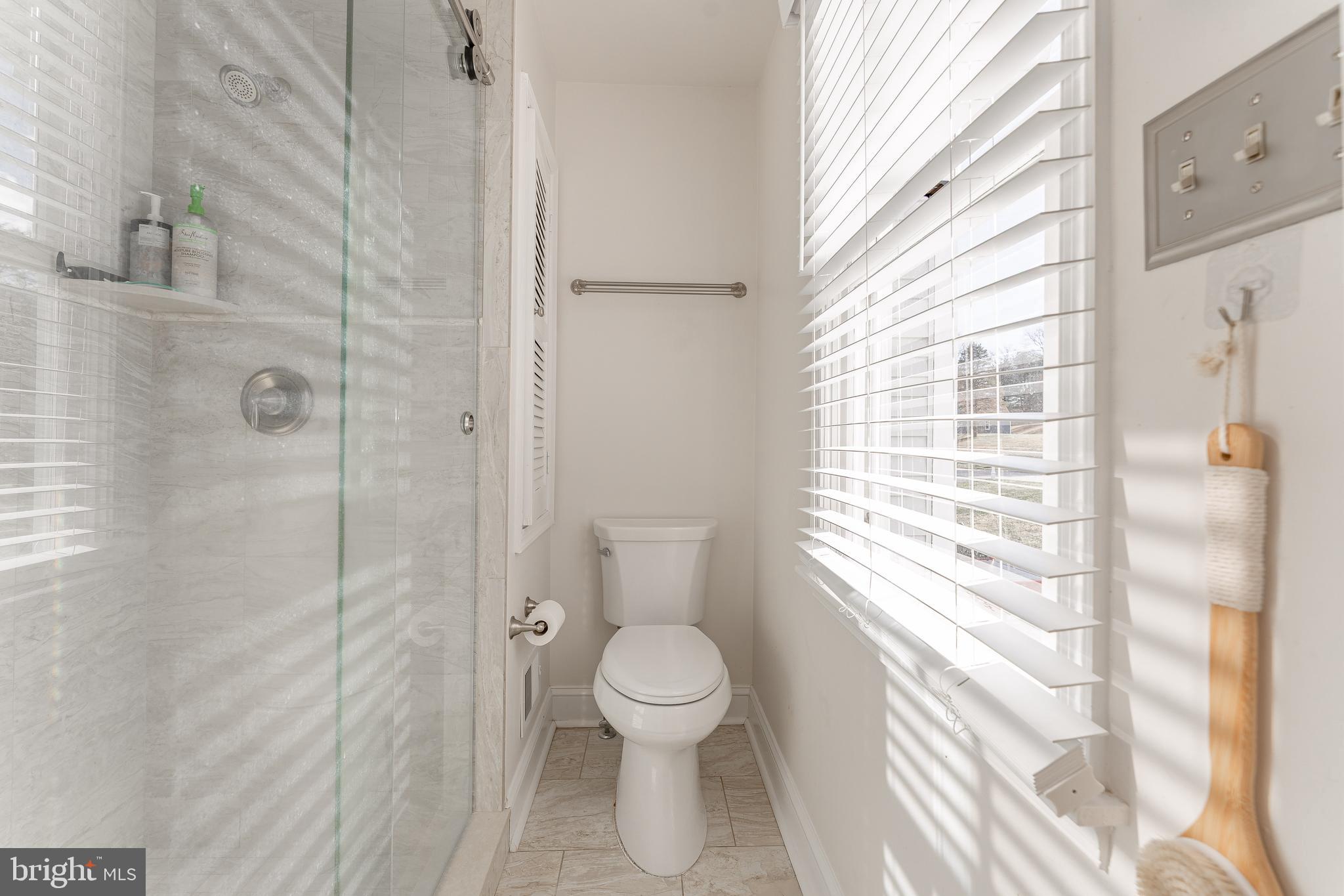 8 Matthews Run Road Chester Springs, PA 19425 - Photo 47 of 80 a bathroom with a toilet and a shower