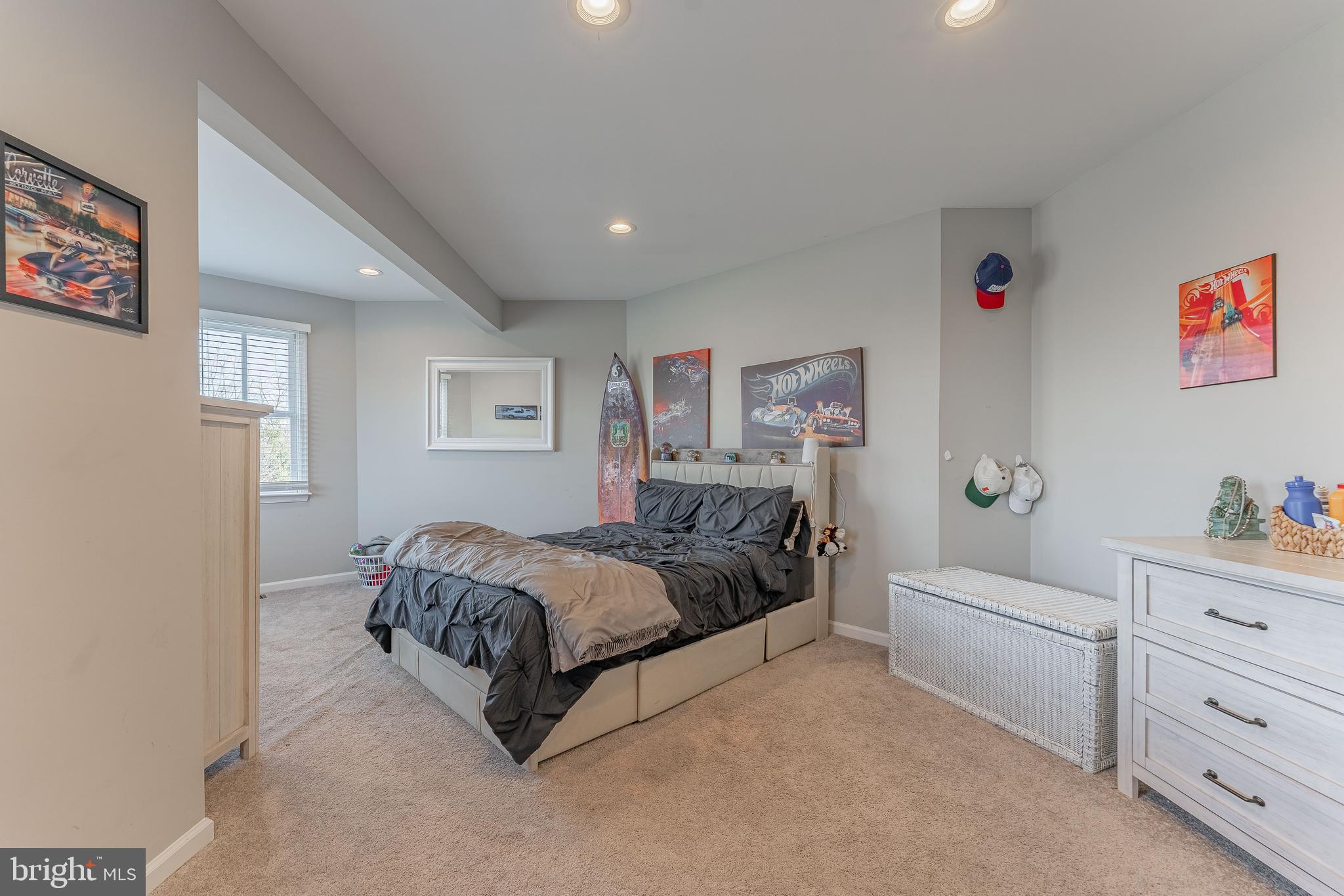 8 Matthews Run Road Chester Springs, PA 19425 - Photo 49 of 80 a spacious bedroom with a bed and a couch