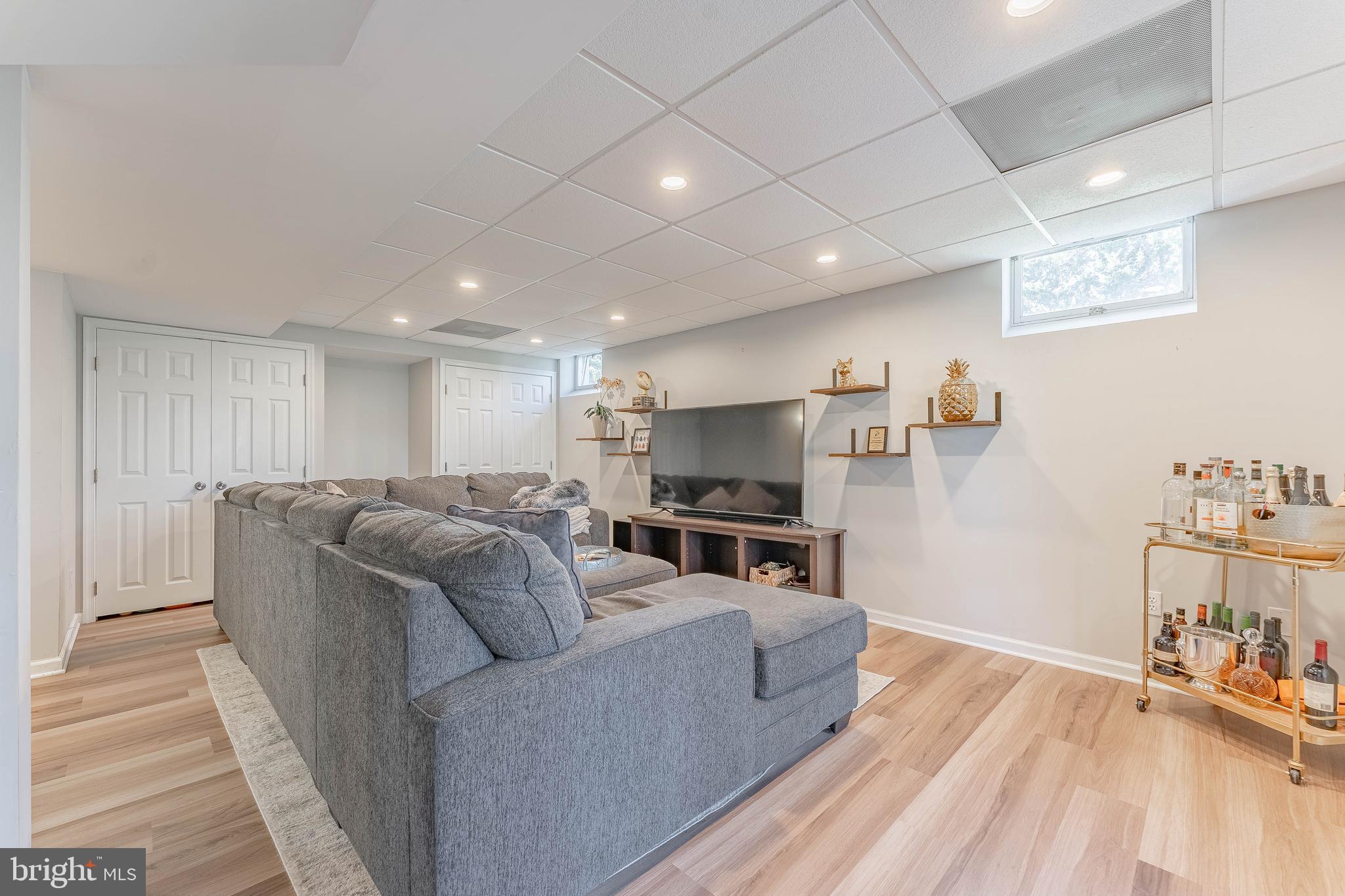 8 Matthews Run Road Chester Springs, PA 19425 - Photo 55 of 80 a living room with furniture and a flat screen tv