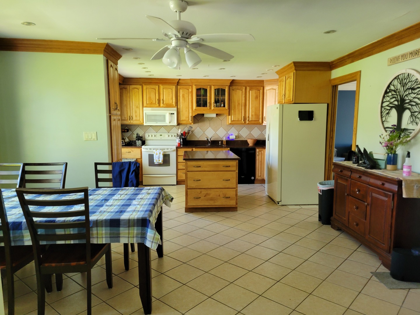 1322 Elder Road Homewood, IL 60430 - Photo 15 of 27 a dining room with furniture and window