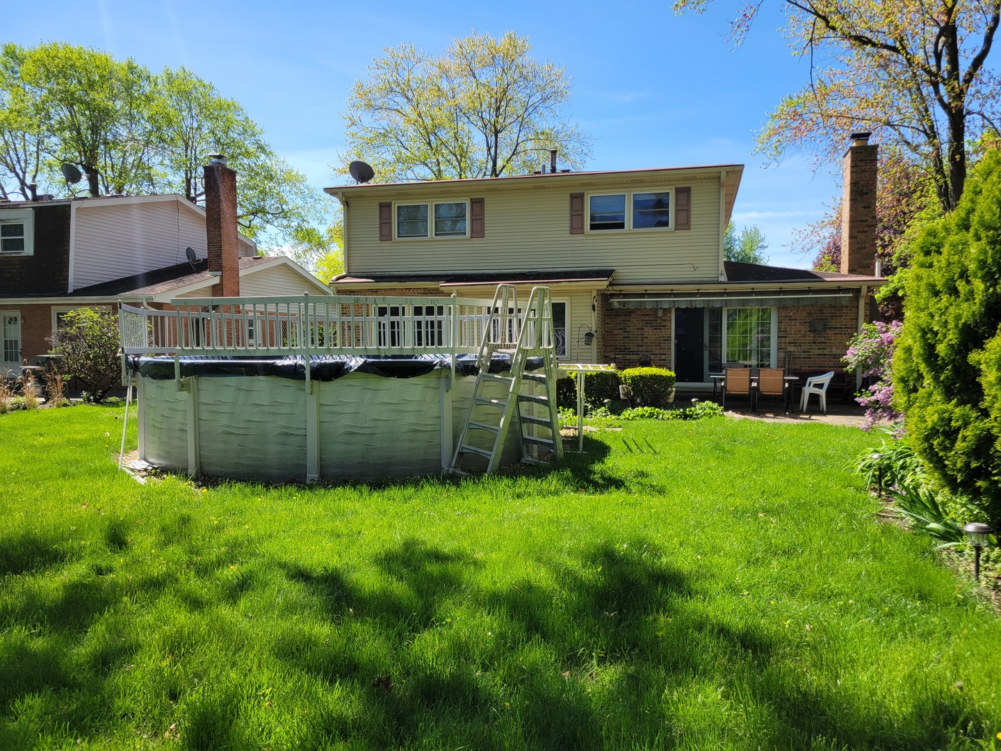 1322 Elder Road Homewood, IL 60430 - Photo 5 of 27 a view of a house with a yard and sitting area