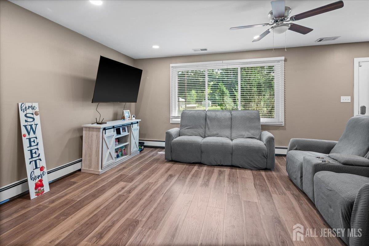 5 Applegate Road Jobstown, NJ 08041 - Photo 2 of 34 a living room with furniture and a flat screen tv