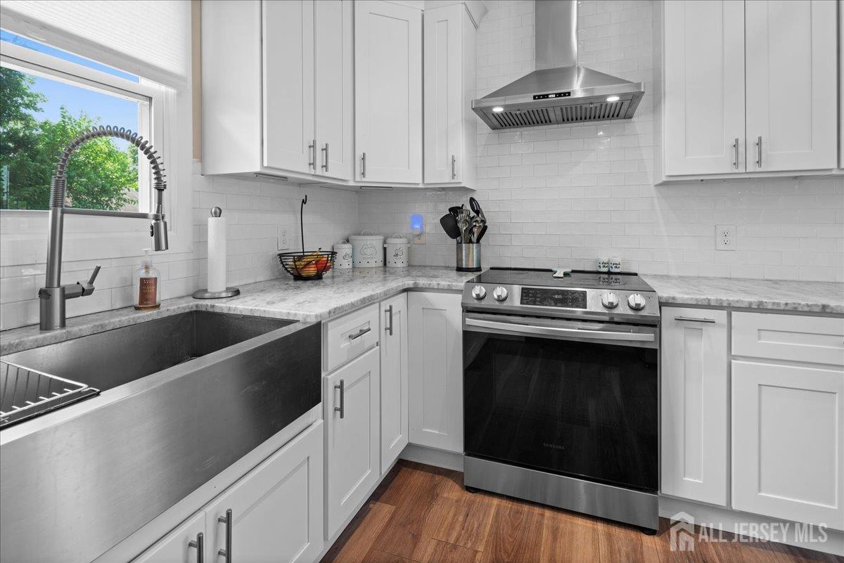 5 Applegate Road Jobstown, NJ 08041 - Photo 10 of 34 a kitchen with stainless steel appliances granite countertop a sink stove and cabinets