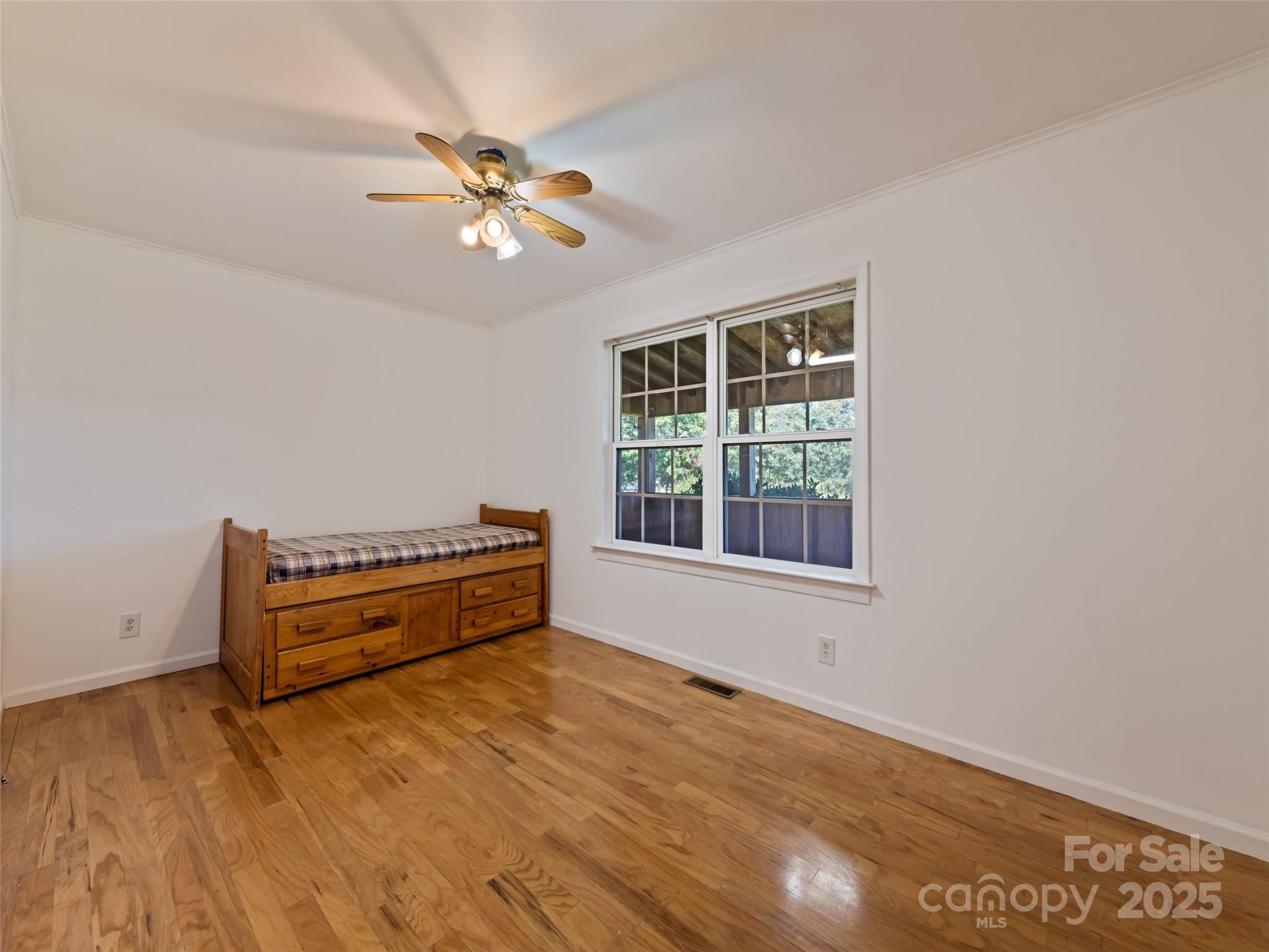 2884 Thickety Road Clyde, NC 28721 - Photo 17 of 20 wooden floor in a room with a window