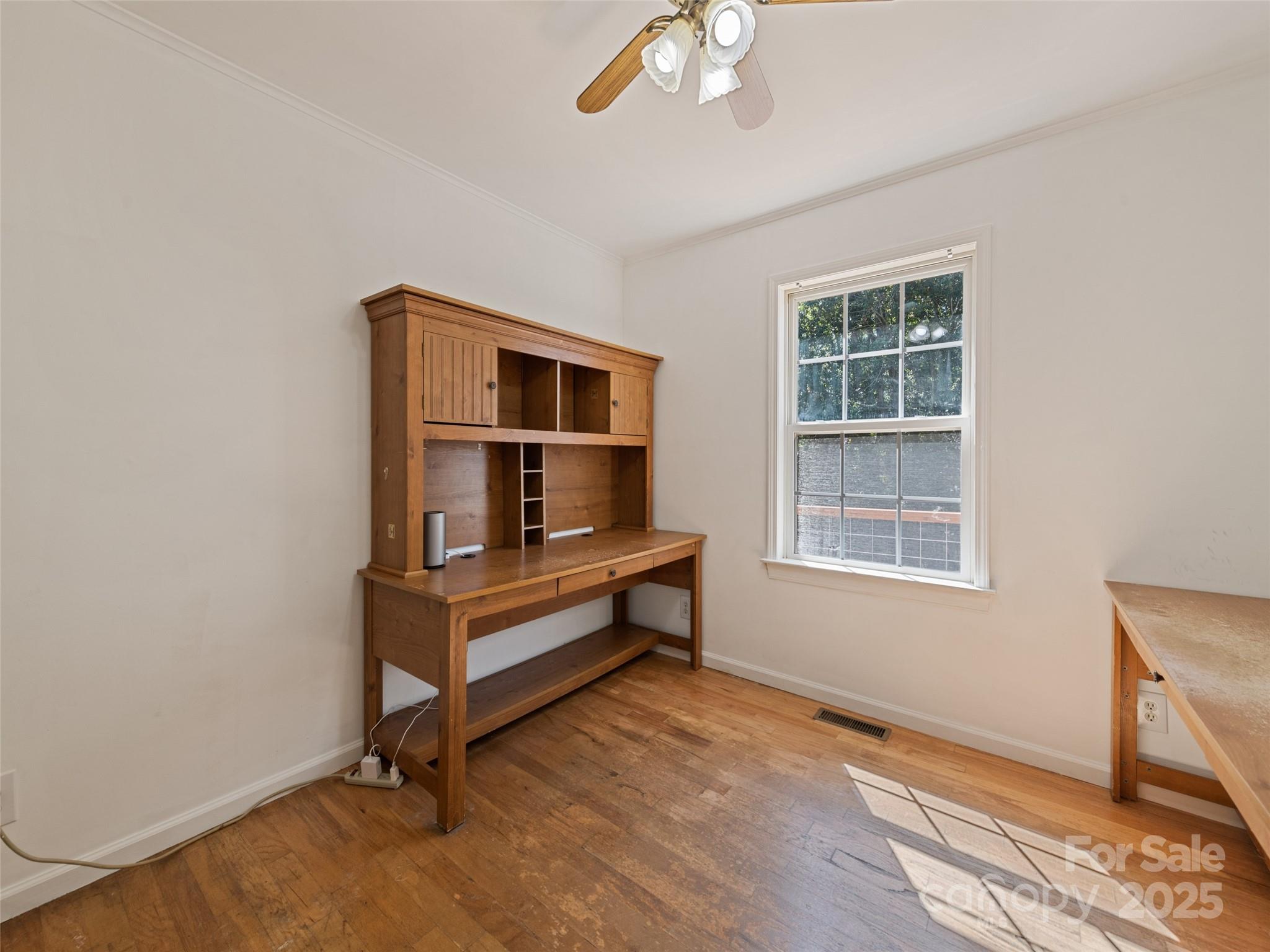 2884 Thickety Road Clyde, NC 28721 - Photo 18 of 20 a living room with furniture and a window