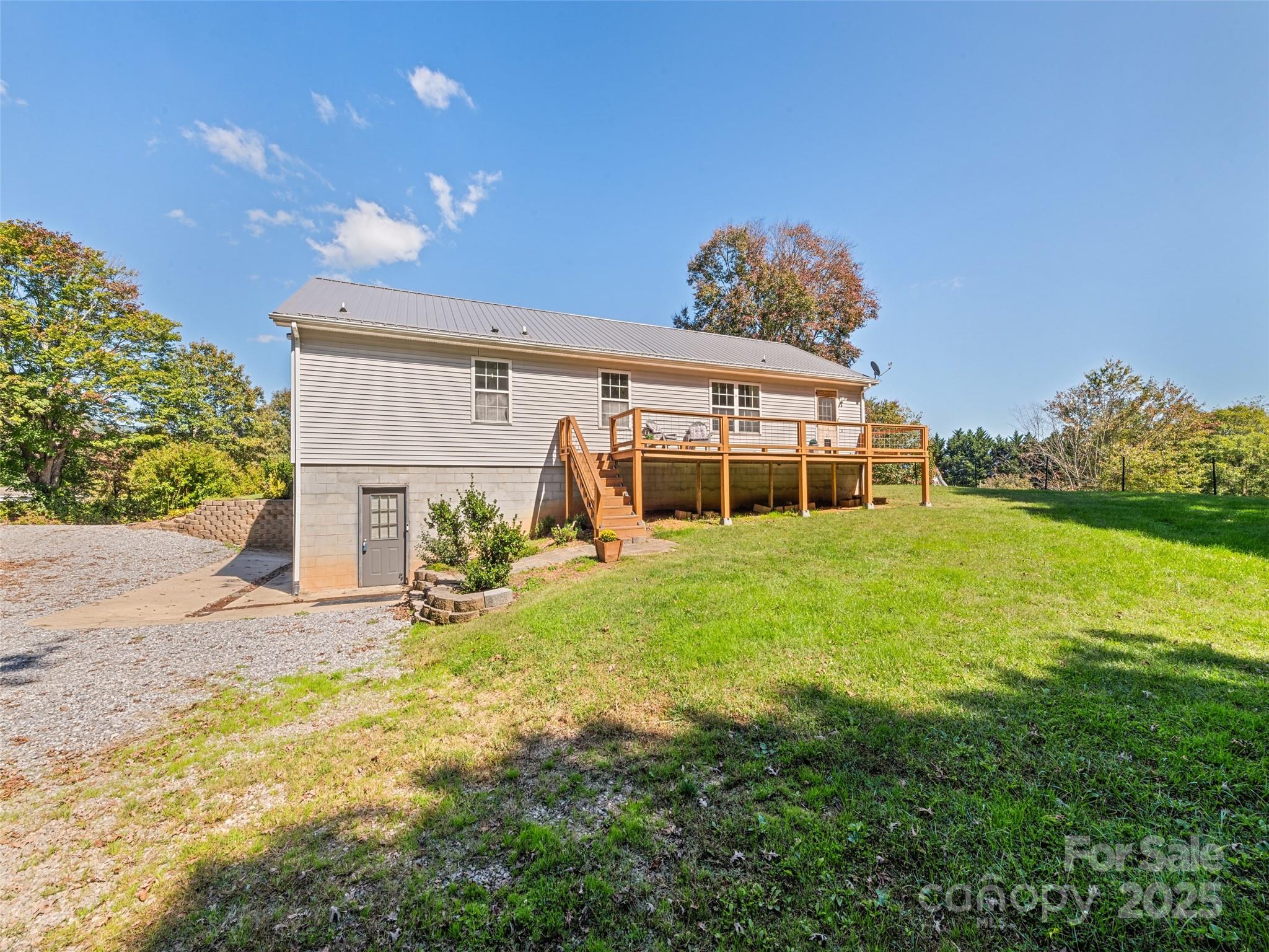 2884 Thickety Road Clyde, NC 28721 - Photo 2 of 20 a front view of a house with a yard