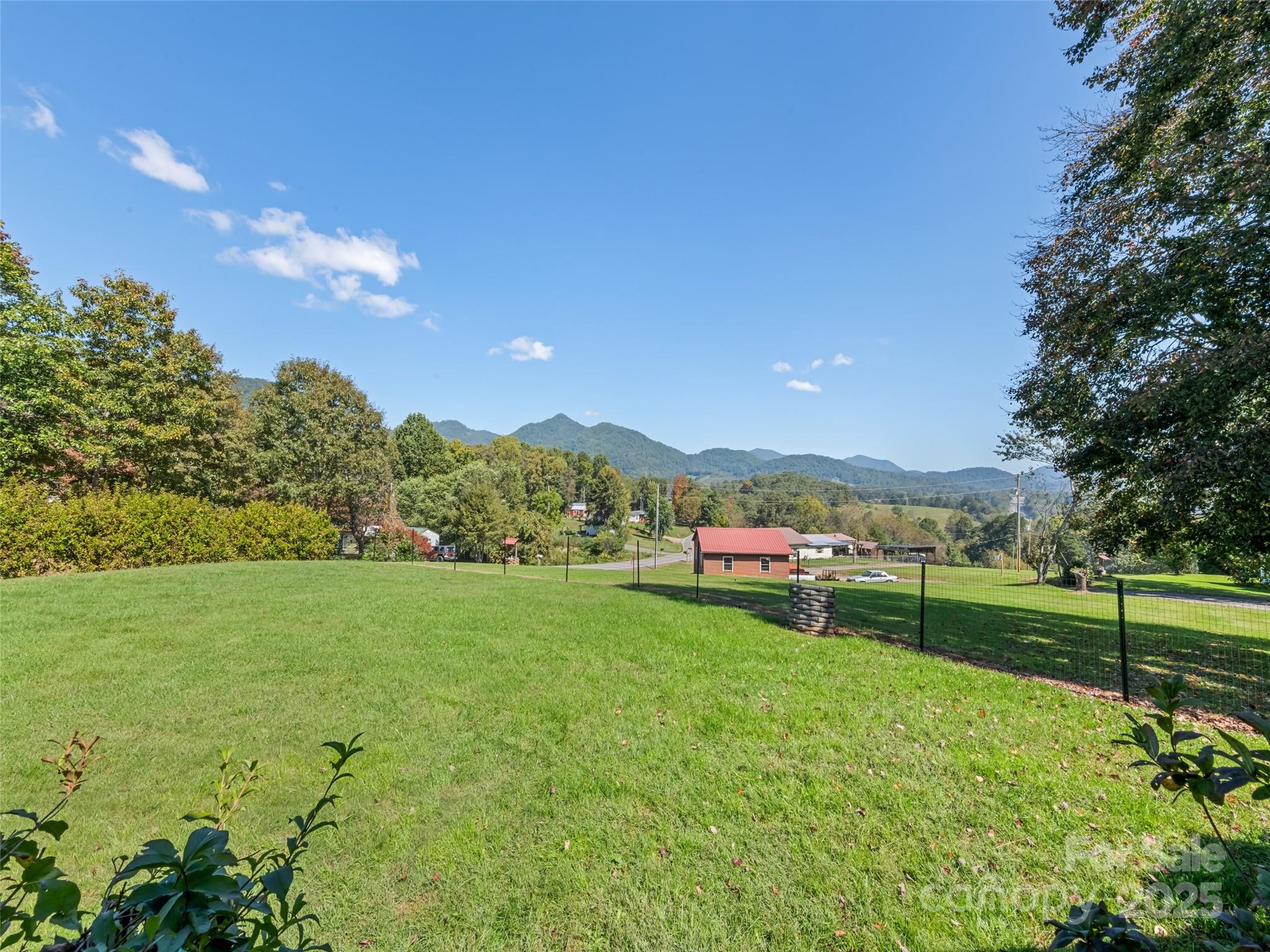 2884 Thickety Road Clyde, NC 28721 - Photo 5 of 20 a view of a garden with an outdoor space and seating area