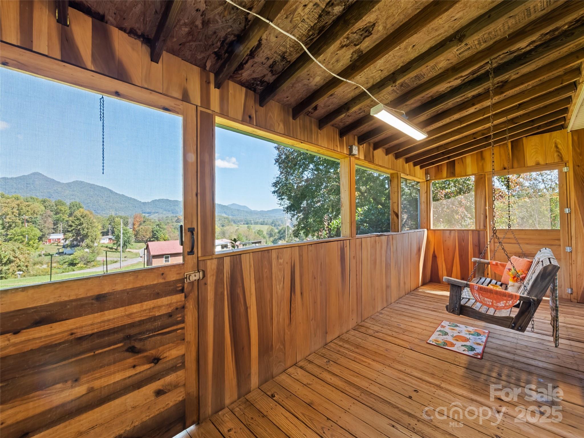 2884 Thickety Road Clyde, NC 28721 - Photo 6 of 20 a view of sitting area with wooden floor
