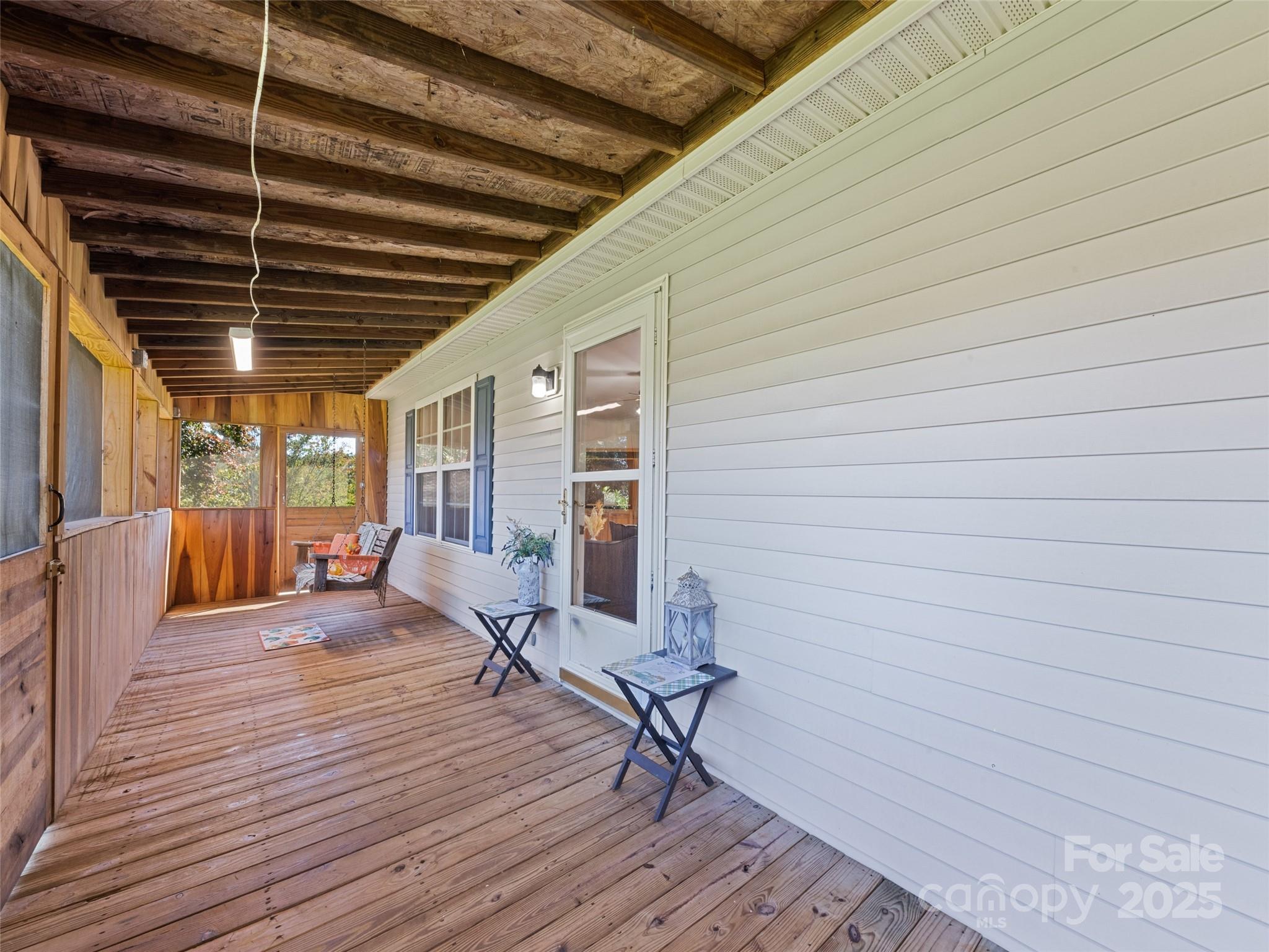2884 Thickety Road Clyde, NC 28721 - Photo 7 of 20 a view of a room with wooden floor