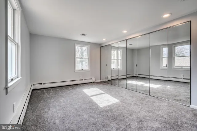 an empty room with windows