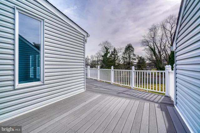 a view of a pathway with a yard