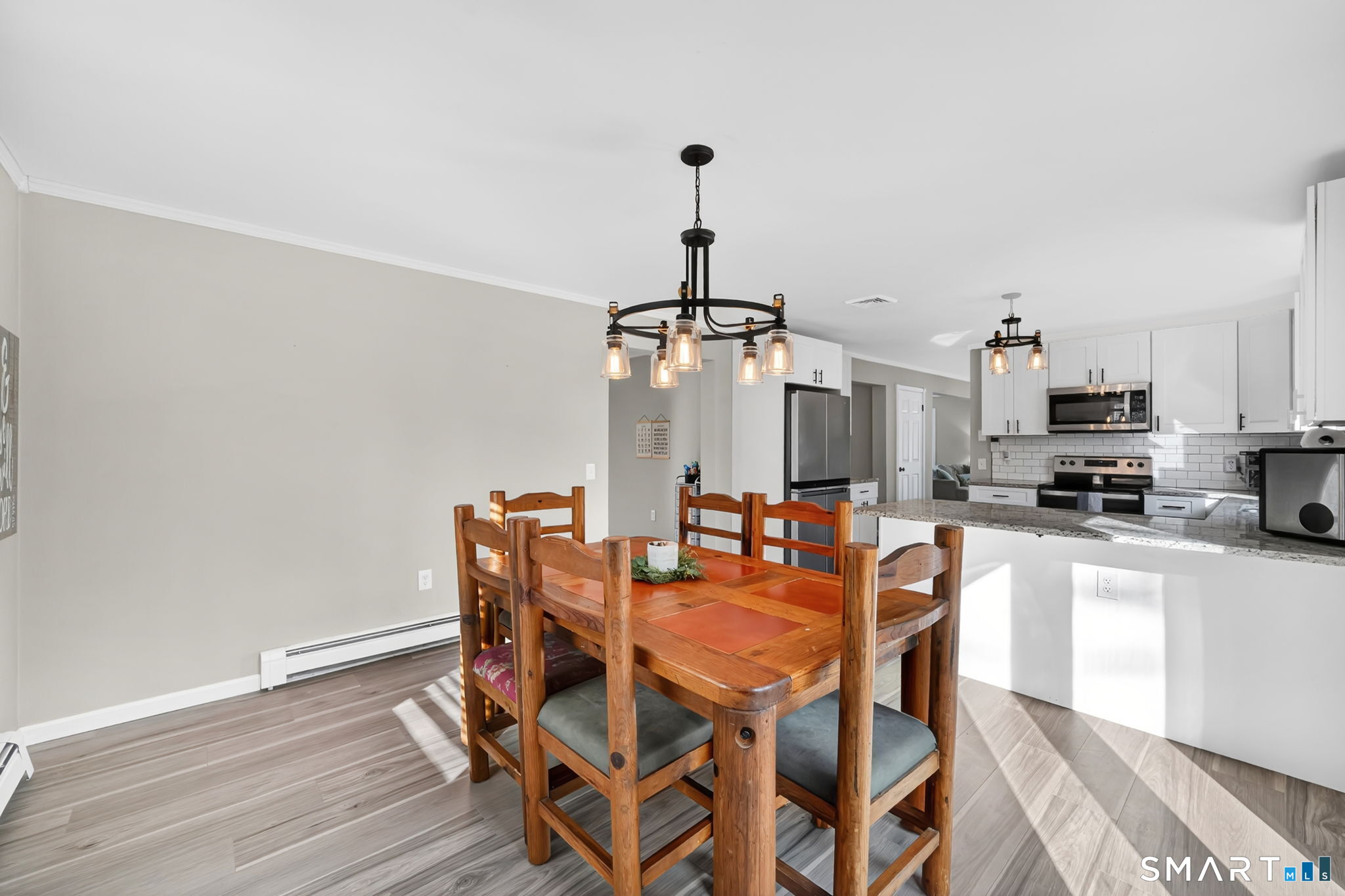 97 Bass Road Windham, CT 06280 - Photo 12 of 40 a view of a dining room with furniture