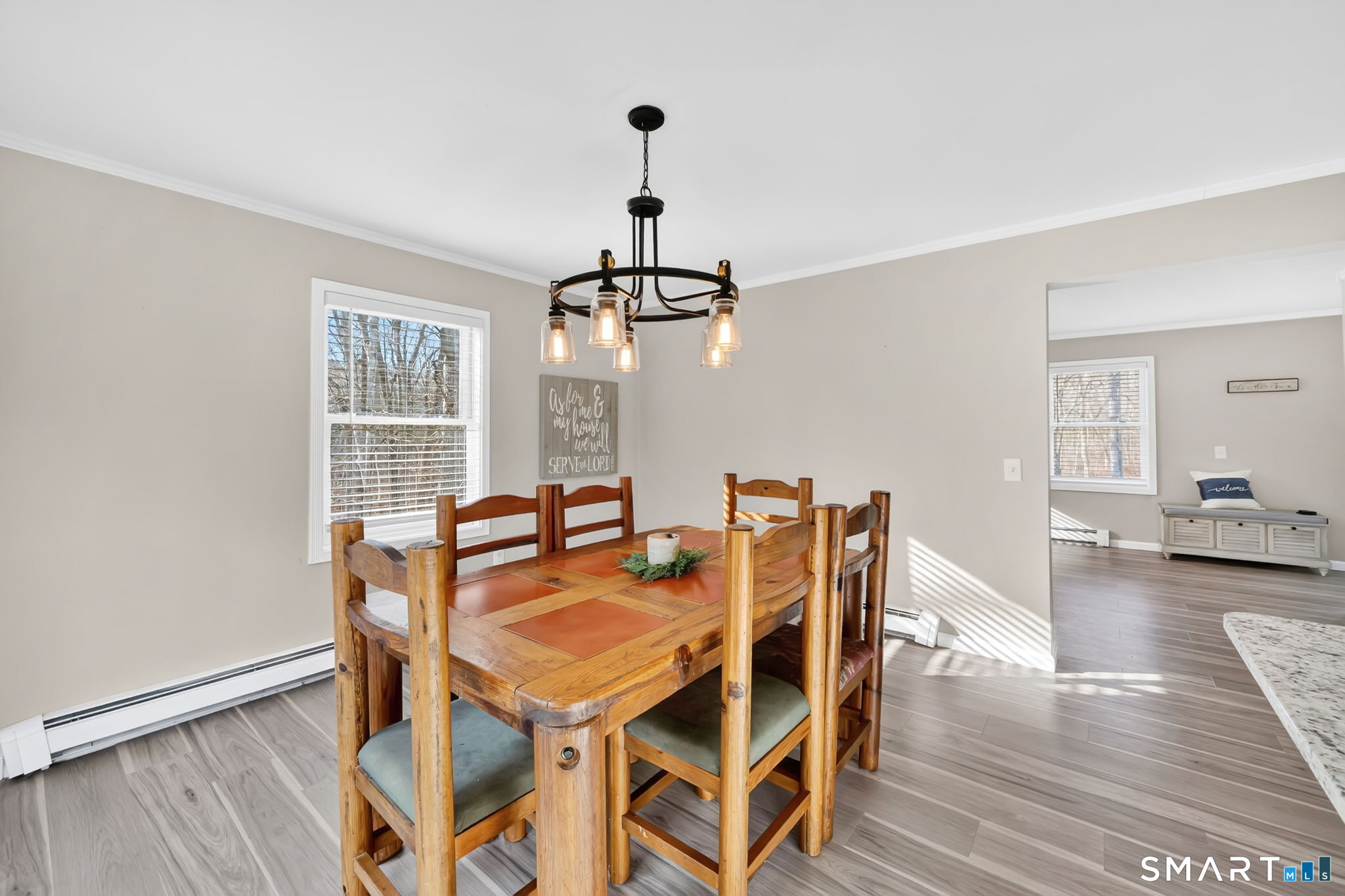 97 Bass Road Windham, CT 06280 - Photo 14 of 40 a view of a dining room with furniture and wooden floor