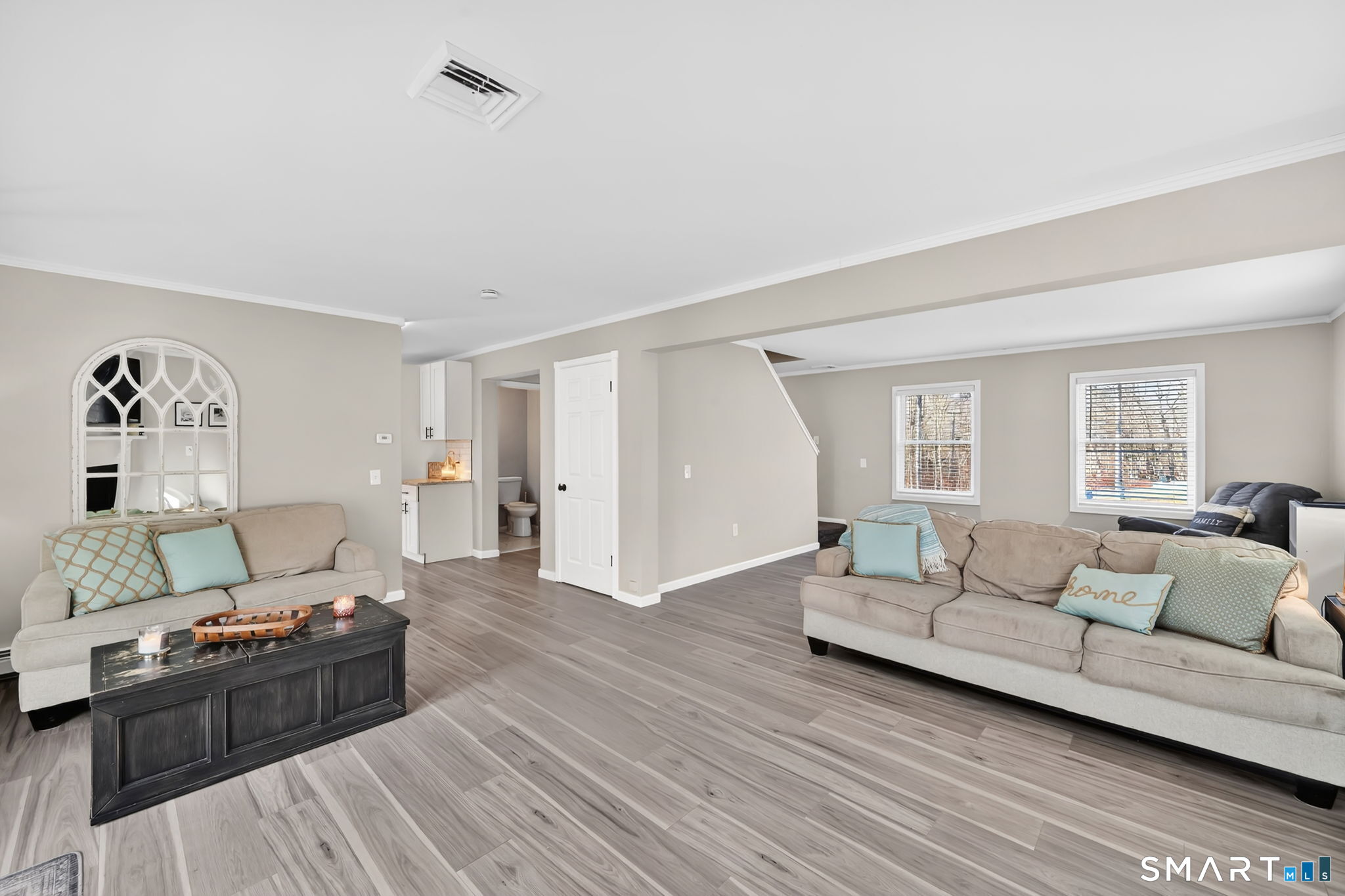 97 Bass Road Windham, CT 06280 - Photo 19 of 40 a living room with furniture and a wooden floor