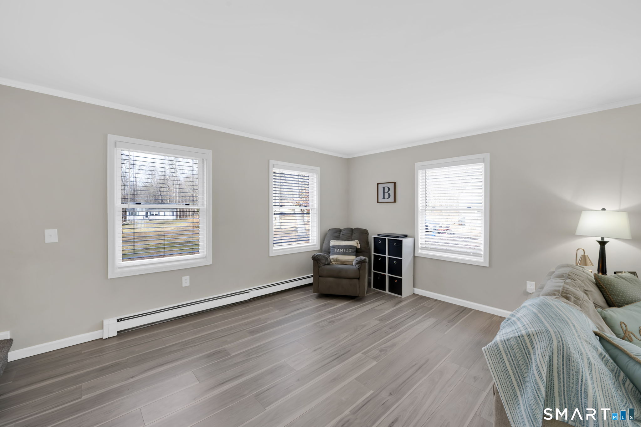 97 Bass Road Windham, CT 06280 - Photo 21 of 40 a bedroom with furniture and a window