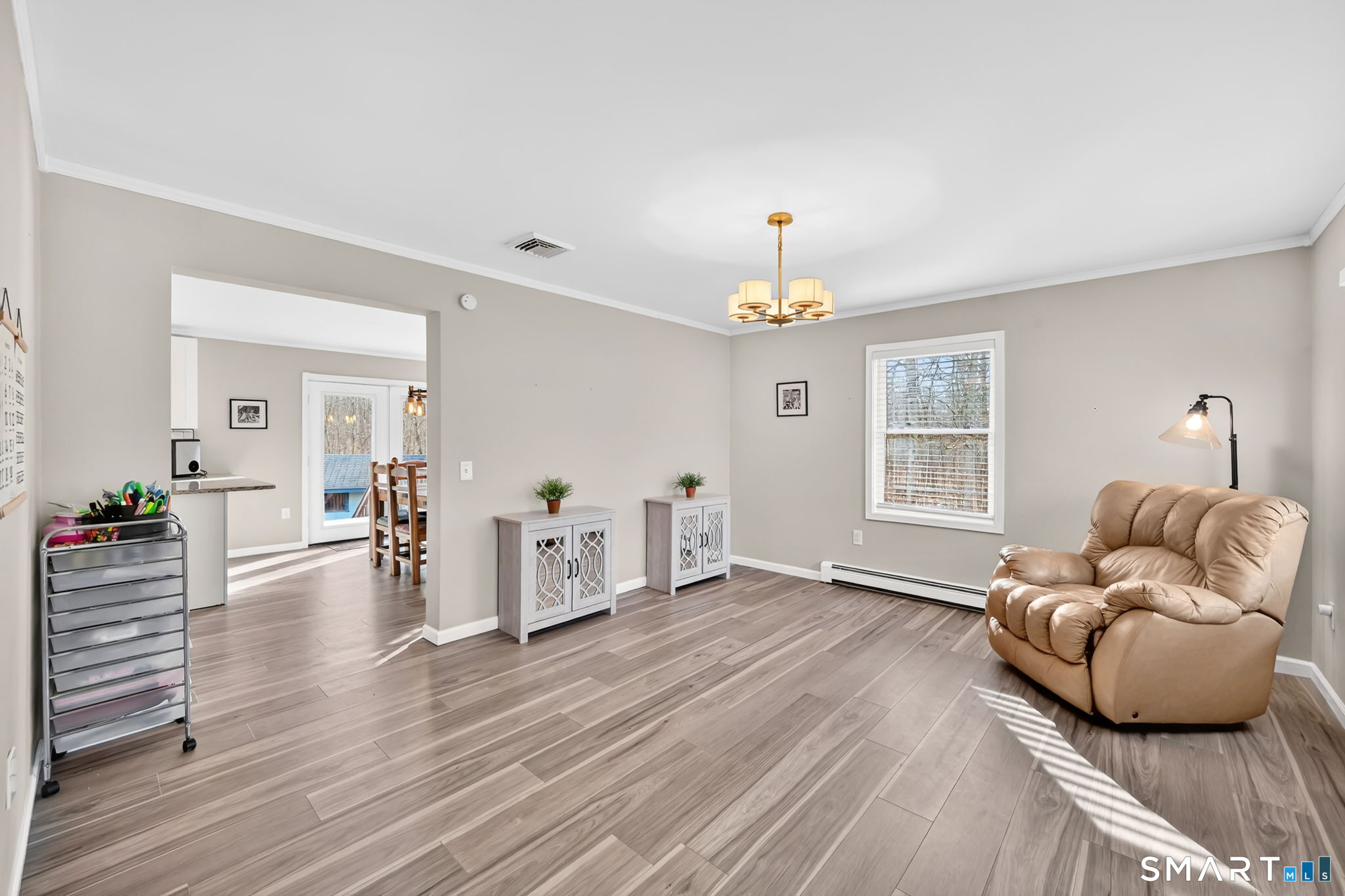 97 Bass Road Windham, CT 06280 - Photo 24 of 40 a living room with furniture and wooden floor