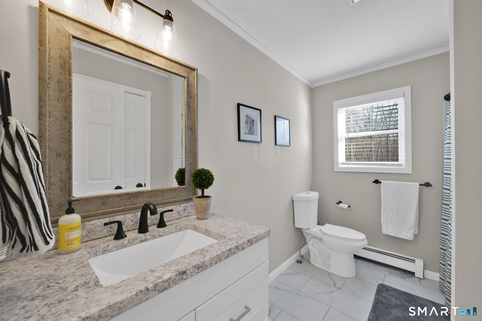 97 Bass Road Windham, CT 06280 - Photo 34 of 40 a bathroom with a granite countertop sink and a mirror