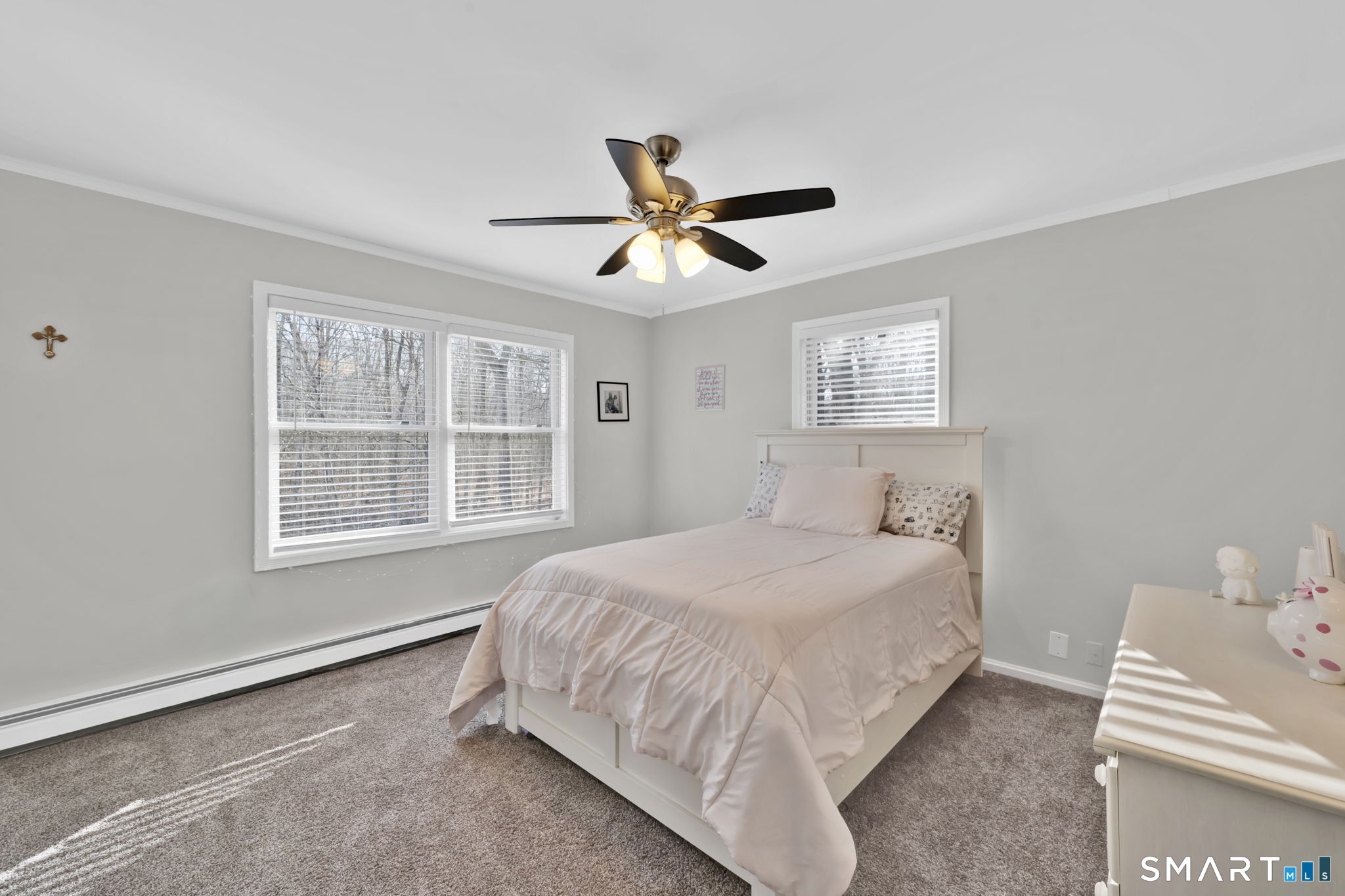 97 Bass Road Windham, CT 06280 - Photo 35 of 40 a bedroom with a bed and wooden floor