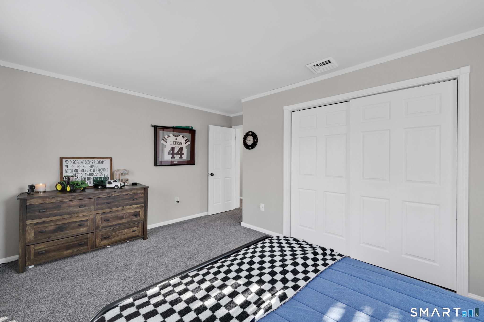 97 Bass Road Windham, CT 06280 - Photo 38 of 40 a view of a bedroom with furniture and cabinet