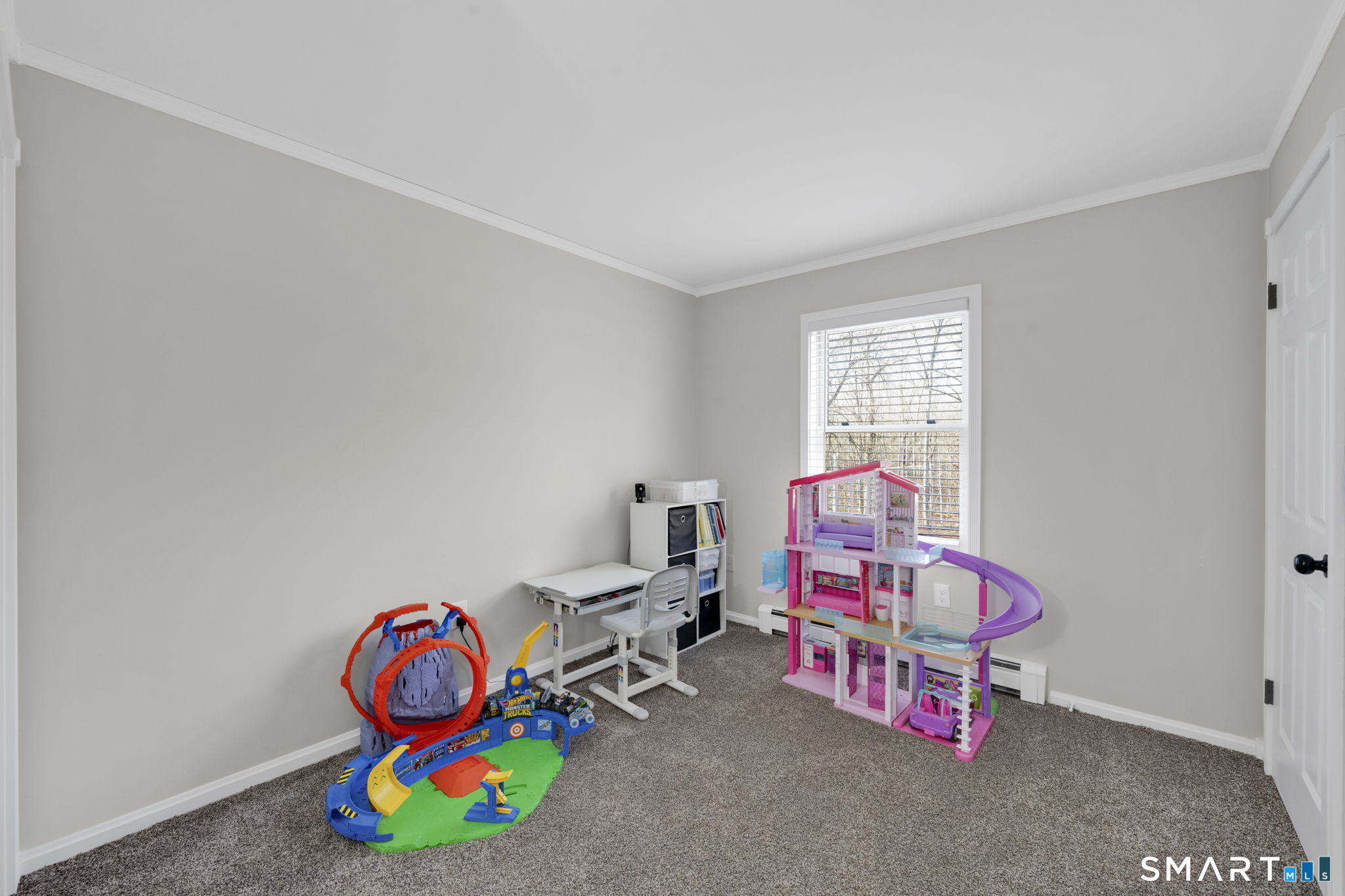 97 Bass Road Windham, CT 06280 - Photo 39 of 40 a room with toys and a wooden floor