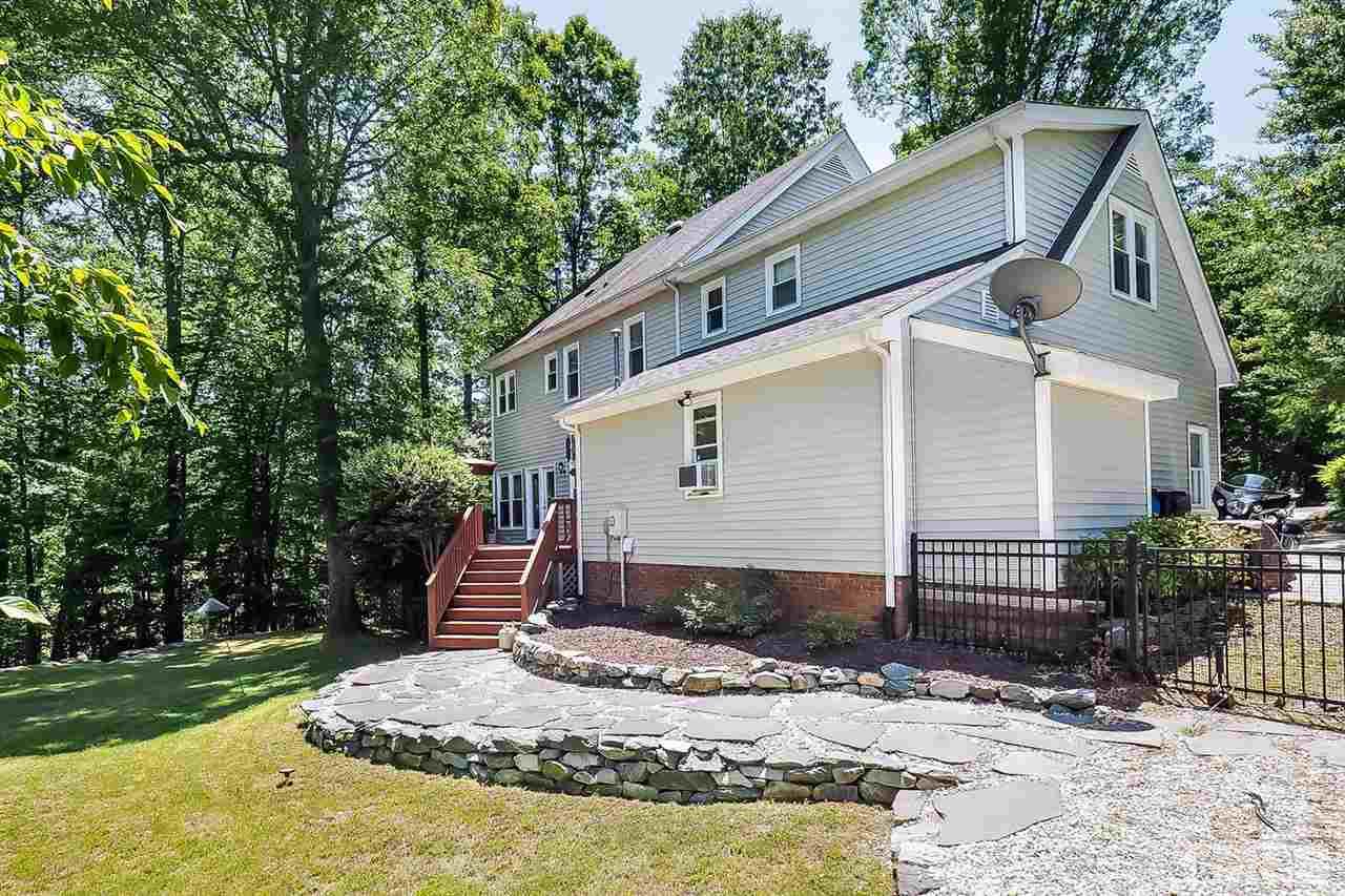 3309 Byers Drive Raleigh, NC 27607 - Photo 25 of 25 Yard has newly poured sidewalk and delightful fountain.