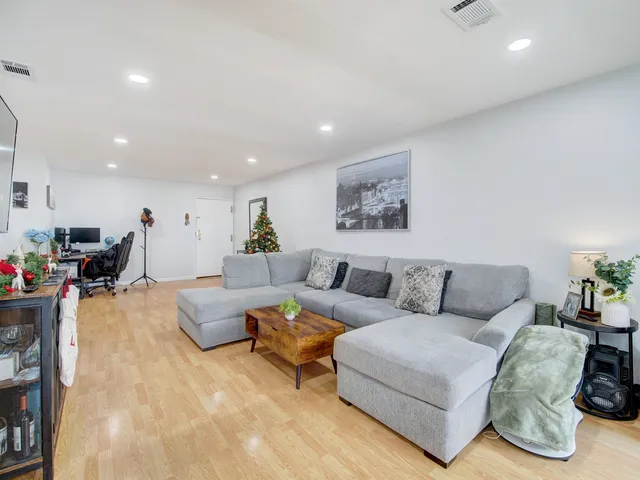 a living room with furniture and a couch