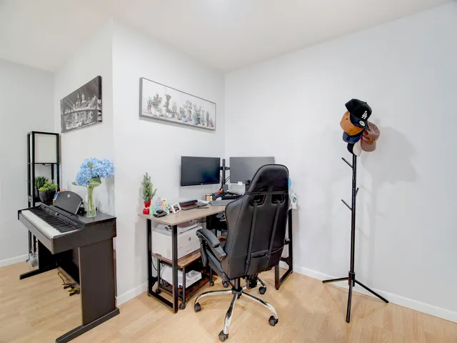 a view of a workspace with furniture