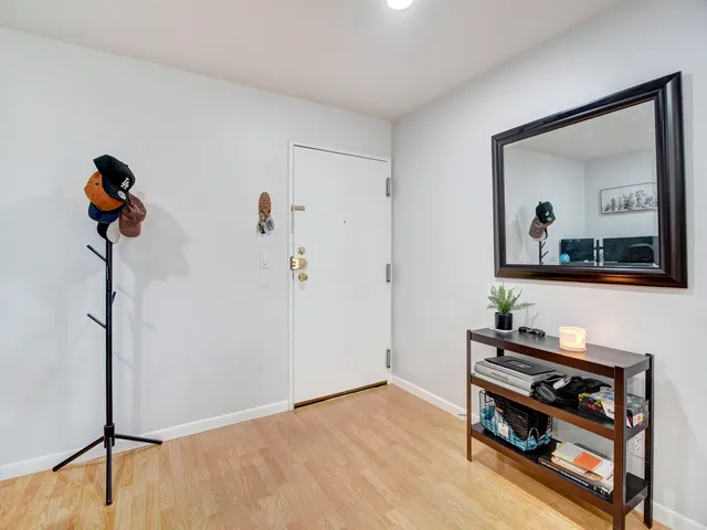 a view of a hallway with workspace