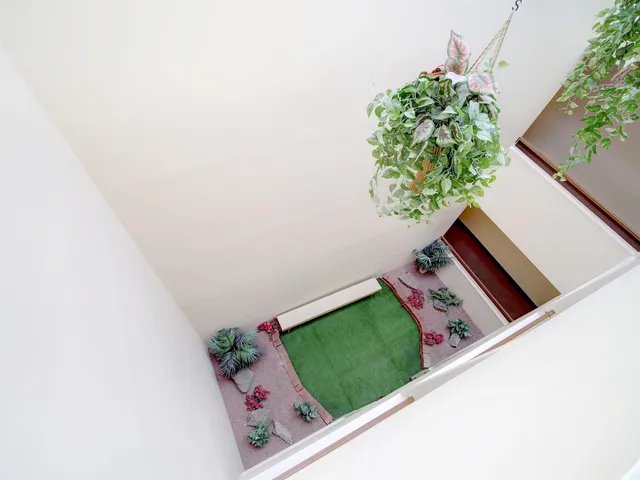 a view of a hallway with entryway