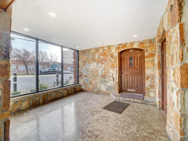 a view of front door with livingroom