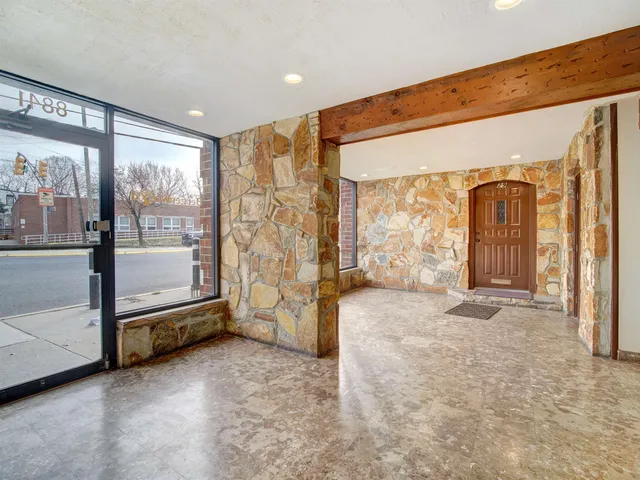 a view of a building with a street