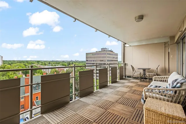 a view of roof deck with seating space