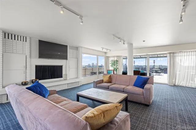 a outdoor living space with furniture and garden view