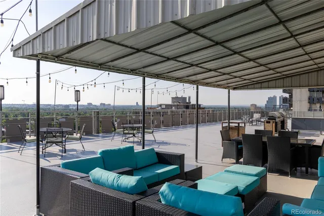 a view of a terrace with sitting area