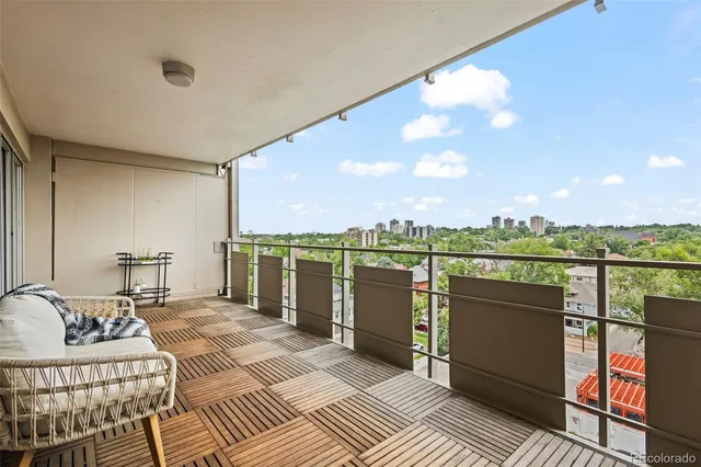 a balcony with furniture