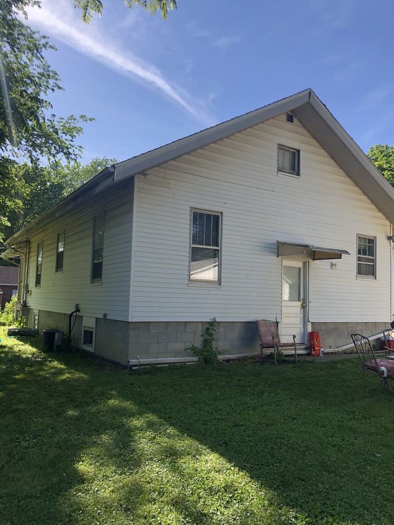 300 North Maple Street Normal, IL 61761 - Photo 2 of 18 a front view of house with yard